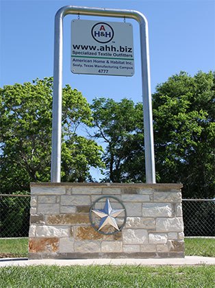 American Home & Habitat Inc. - Specialized Textile Outfitters - Houston I-10 Energy Corridor Manufacturing Campus - Sealy TX - Highway Sign