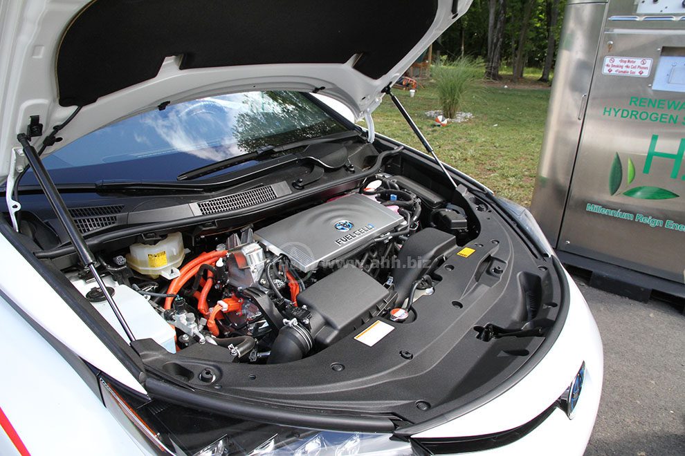 Under the hood of the Toyota Mirai next to the Hydrogen Fueling Appliance