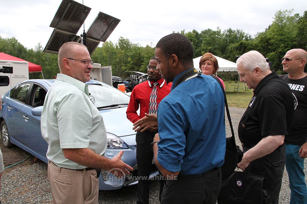 Mike Stizki greats representatives from a New Jersey College who came to hear more about the Hydrogen House Project