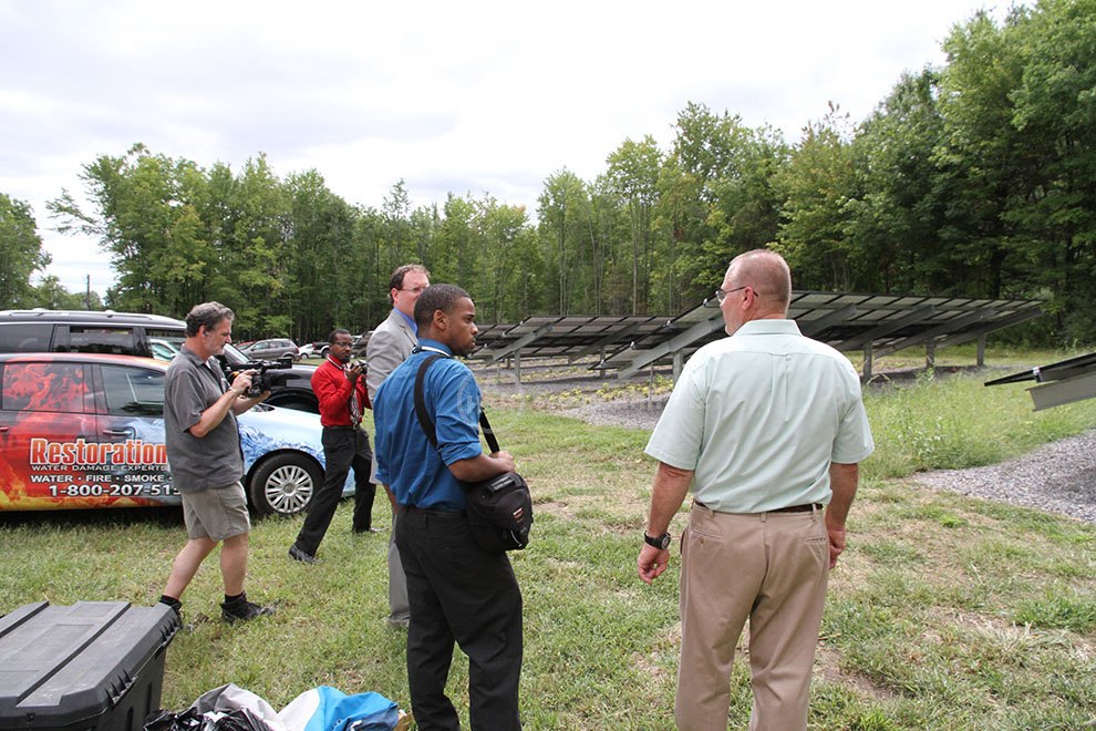 Mike Strizki conducts a tour of the Solar Panel array, part of the Hydrogen House System which can allow it's owner to generate all their own electricity